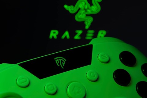 Dhaka, Bangladesh- 13 Sep 2025: A close-up of a gamepad with the Razer seen on screen in the