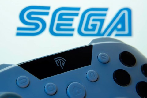 Dhaka, Bangladesh- 13 Sep 2025: A close-up of a gamepad with the Sega seen on screen in the
