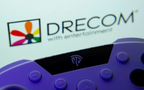 Dhaka, Bangladesh- 12 June 2025: A close-up of a gamepad with the Drecom seen on screen in the