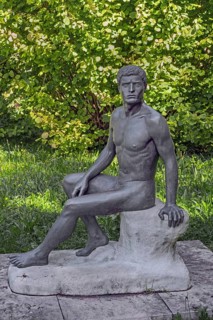 Male sculpture, bronze copy, title Wäcnter, by WLHELM RIEDISSER, in the castle park in Kisslegg,