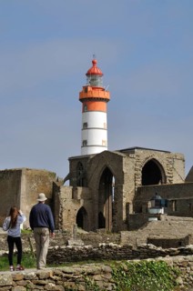 Pointe St Mathieu and Abbey Lighthouse, A historical lighthouse stands amidst ancient stone ruins