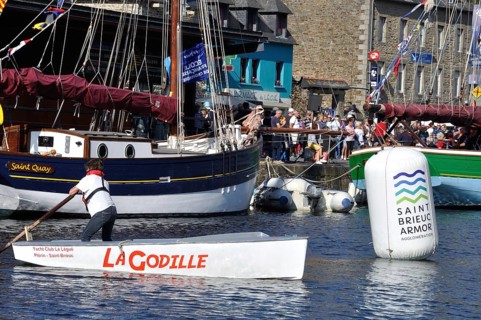 Sculling demonstration at the Solitaire du Figaro in Plérin in Brittany, France redactional use