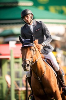 Joseph Stockdale of Great Britain, riding Ebanking, competes in the 2025 Spruce Meadows Masters on