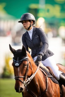 Alessandra Reich of Austria, riding Oeli R, competes in the 2025 Spruce Meadows Masters on