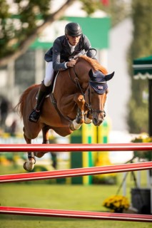 Joseph Stockdale of Great Britain, riding Ebanking, competes in the 2025 Spruce Meadows Masters on