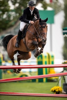 Kristaps Neretnieks of Austria, riding Valour competes in the 2025 Spruce Meadows Masters on