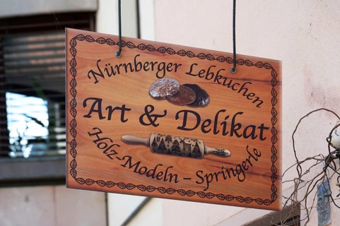 Nose sign at a shop for gingerbread and baking accessories, Trödelmarkt 45, Nuremberg, Central