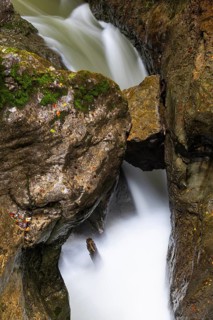 Pouring water in the gorge, trapped rock boulder, Schrattenkalk, Breitachklamm, Oberstdorf, Allgäu