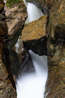 Pouring water in the gorge, trapped rock boulder, Schrattenkalk, Breitachklamm, Oberstdorf, Allgäu