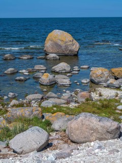 Stones on the shore of the island of Stora grundet on the northern tip of the Swedish island of