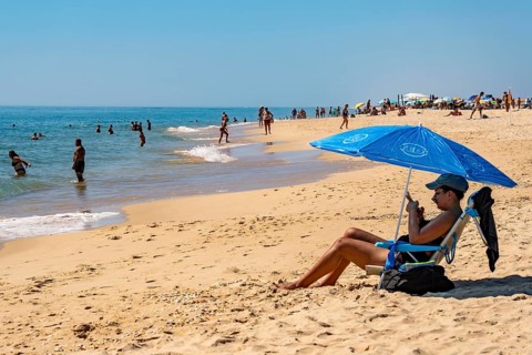 Kilometre-long beach Praia da Ilha de Tavira, on the island off Tavira, partly managed, Algarve,