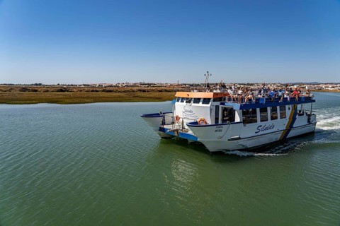 Ride on the Silnido ferry from Tavira on the Gilão River to the beach Praia da Ilha de Tavira, on