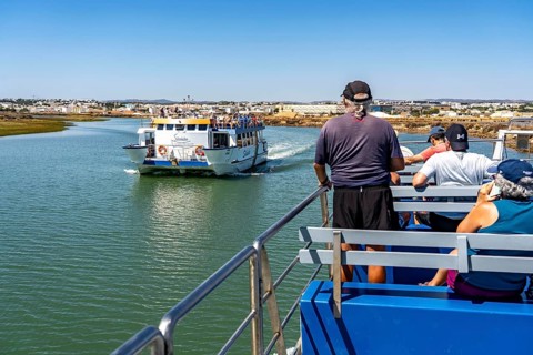 Ride on the Silnido ferry from Tavira on the Gilão River to the beach Praia da Ilha de Tavira, on