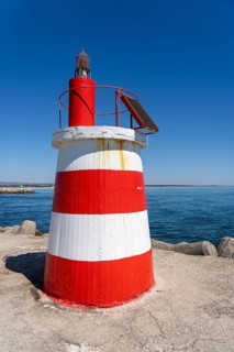 Lighthouse at the kilometre-long beach Praia da Ilha de Tavira, on the island in front of Tavira,