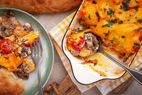 Madame Bovary's Georgian dish, chicken fillet with mushrooms, tomatoes and cheese, baked in a mold