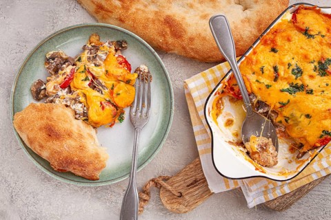 Madame Bovary's Georgian dish, chicken fillet with mushrooms, tomatoes and cheese, baked in a mold