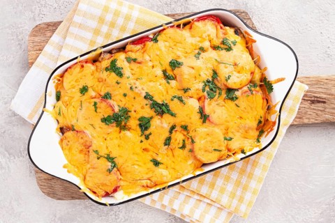 Madame Bovary's Georgian dish, chicken fillet with mushrooms, tomatoes and cheese, baked in a mold