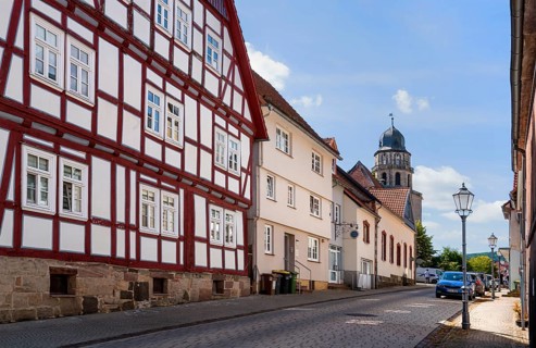 Half-timbered house facade, Protestant Church, Evangelische Stadtkirche, Zierenberg, district of