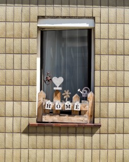 Monoton tiled house facade with decorated windows, Zierenberg, district of Kassel, Hesse, Germany