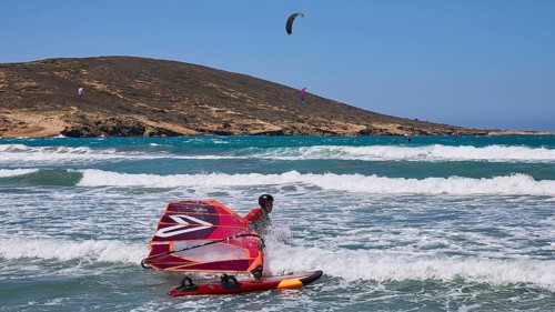 Windsurfer on the water with vivid colours and clear sky, Prasonisi, beach, surf, windsurfer, kite