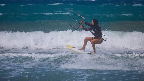 Photo of a kitesurfer jumping over the waves of the ocean, Prasonisi, beach, surf, windsurfer, kite