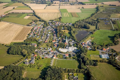 Aerial view, view of the town, St Christophorus parish church, Woestegraben pond, F. Schumacher