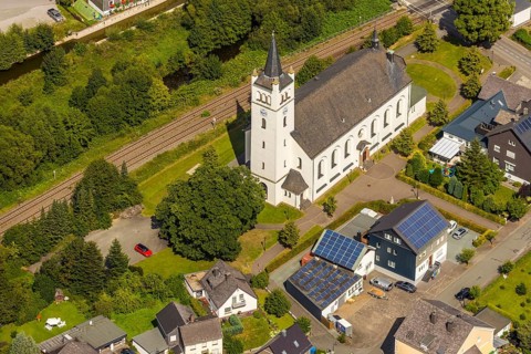 Aerial view, St. Andrew's Catholic Church, EKI-Therm company building with solar panel, Velmede,