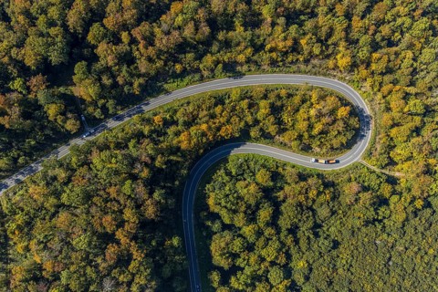 Aerial view, serpentine road in forest area, north of Jakobsberg, Beverungen, East