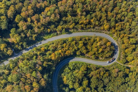 Aerial view, serpentine road in forest area, north of Jakobsberg, Beverungen, East