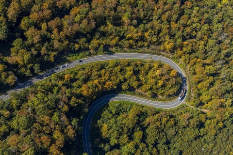 Aerial view, serpentine road in forest area, north of Jakobsberg, Beverungen, East