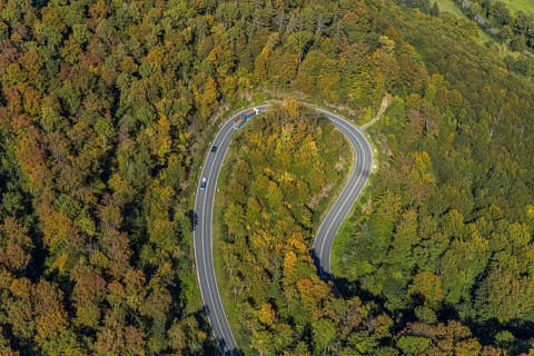 Aerial view, serpentine road in forest area, north of Jakobsberg, Beverungen, East