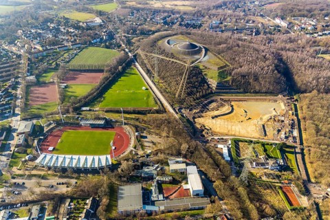 Aerial photograph, Lohrheide stadium, Rheinelbe spoil tip, construction site rainwater retention