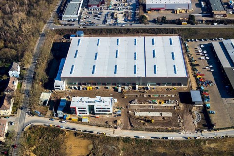 Aerial view, construction site new building BROCK Kehrtechnik GmbH, company headquarters,