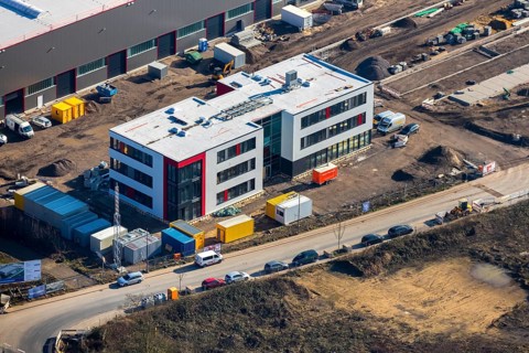 Aerial view, construction site new building BROCK Kehrtechnik GmbH, company headquarters,