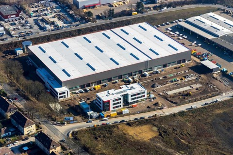 Aerial view, construction site new building BROCK Kehrtechnik GmbH, company headquarters,