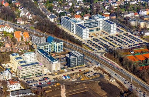 Aerial view, construction site and new construction residential quarter Seven Stones, office
