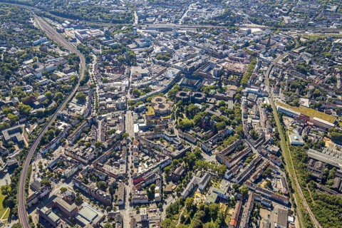 Aerial view, overview Bochum city centre from north to south with central station, mining museum,