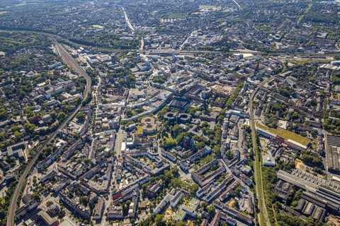 Aerial view, overview Bochum city centre from north to south with central station, mining museum,