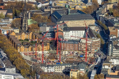 Construction site and new construction for three-part commercial building complex Viktoria Karree,