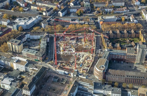 Construction site and new building for three-part commercial building complex Viktoria Karree,