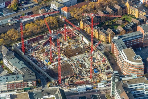 Construction site and new building for three-part commercial building complex Viktoria Karree,