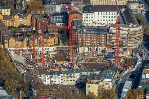 Construction site and new building for three-part commercial building complex Viktoria Karree,