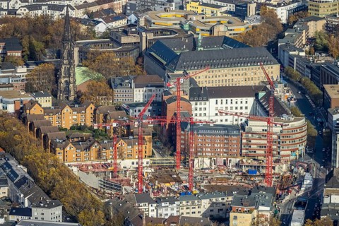 Construction site and new construction for three-part commercial building complex Viktoria Karree,