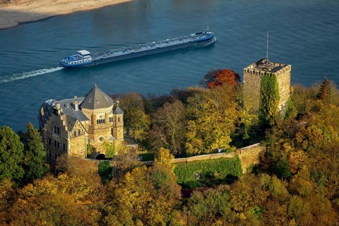 Rheineck Castle in the Rhine Valley, Rhine, autumn leaves, ship, freighter, inland navigation, gas