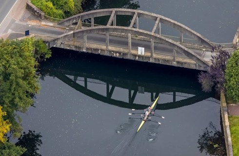 Aerial view, kayaker under the bridge at the Hohenstein hydroelectric power station in Witten, Ruhr