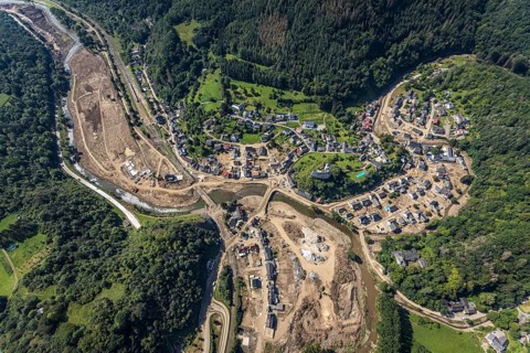 Aerial view, flooded area at the river Ahr with destroyed bridges and historical sight Burg