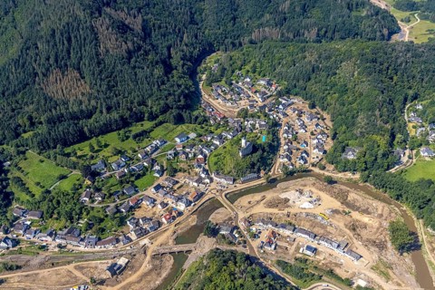 Aerial view, flooded area at the river Ahr with destroyed bridges and historical sight Burg
