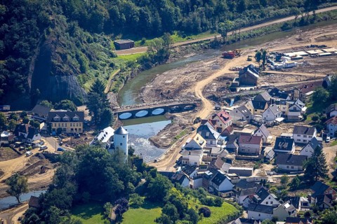 Aerial view, flooded area at the river Ahr with destroyed bridges and historical sight Burg