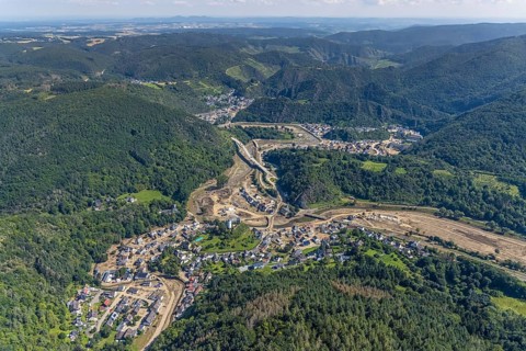 Aerial view, flooded area at the river Ahr with destroyed bridges and historical sight Burg