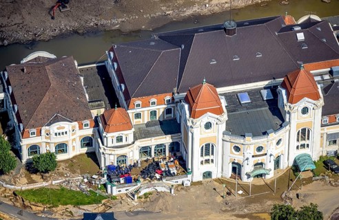 Aerial view, flood area at the river Ahr with spa hotel Bad Neuenahr and furniture on the terrace